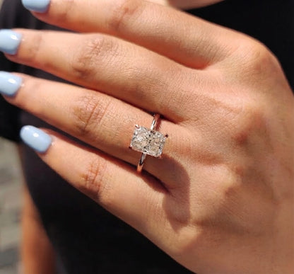 Rediant solitaire ring