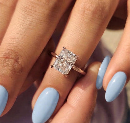 Rediant solitaire ring